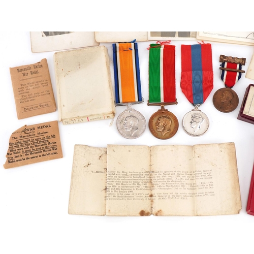 2385A - Three British military medals awarded to Henry W Notley and E Notley together with paperwork and pho... 