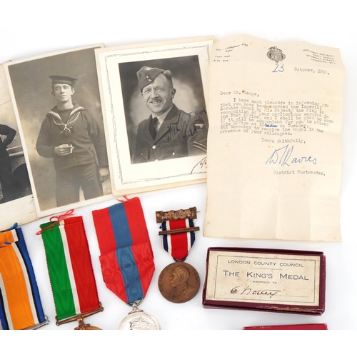 2385A - Three British military medals awarded to Henry W Notley and E Notley together with paperwork and pho... 