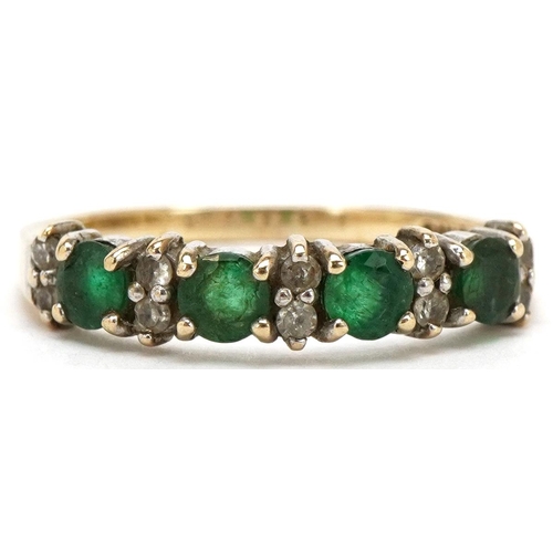 3383 - A 9ct gold emerald and diamond half eternity ring, size Q, 2.0g.