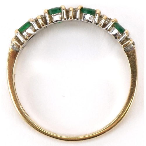 3383 - A 9ct gold emerald and diamond half eternity ring, size Q, 2.0g.