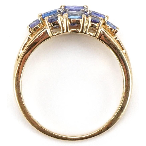 3205 - A 9ct gold iolite and diamond cluster ring, size M, 2.4g.