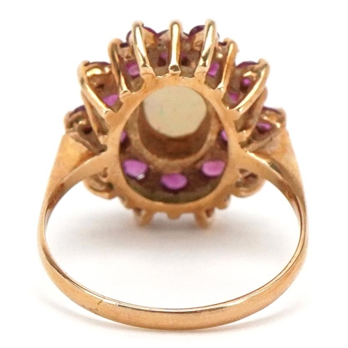 3413 - An unmarked gold cabochon opal and pink spinel three tier cluster ring, size M, 3.4g.