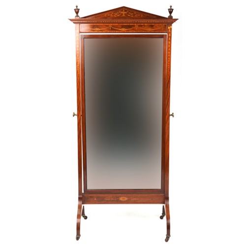  An Edwardian Neo-classical Revival mahogany framed cheval mirror with inlaid decoration, raised on d... 