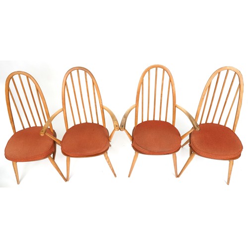 2002 - A set of four Ercol beech and elm hoop back dining chairs together with an Ercol drop flap dining ta... 