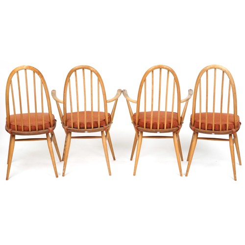 2002 - A set of four Ercol beech and elm hoop back dining chairs together with an Ercol drop flap dining ta... 