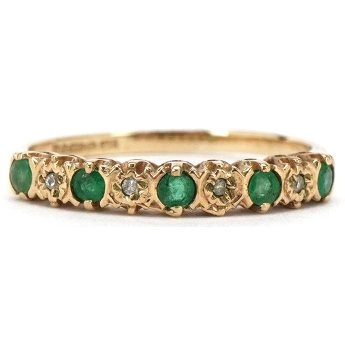 3503 - A 9ct gold emerald and diamond half eternity ring, size N/O, 1.6g.