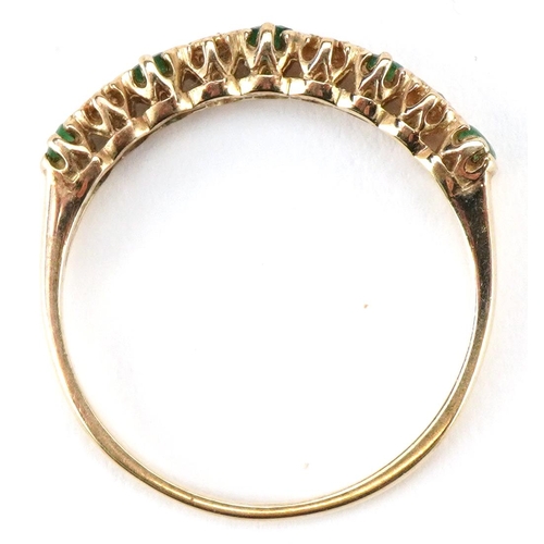 3503 - A 9ct gold emerald and diamond half eternity ring, size N/O, 1.6g.