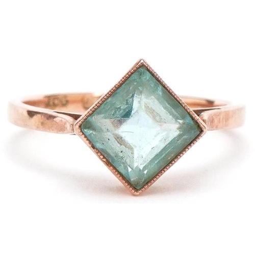 3448 - An Art Deco style 9ct rose gold blue glass ring, size L, 2.1g.