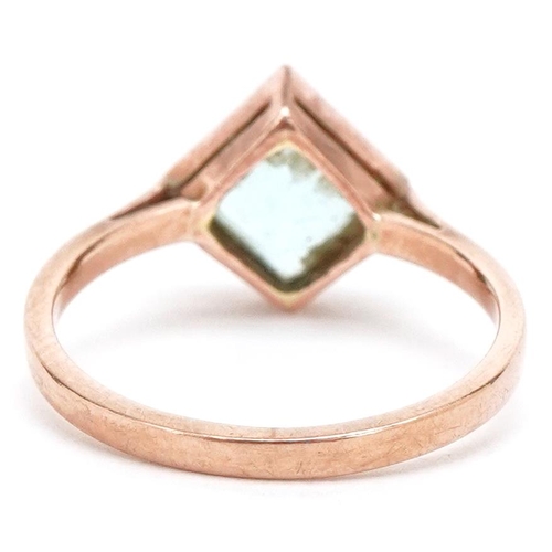 3448 - An Art Deco style 9ct rose gold blue glass ring, size L, 2.1g.