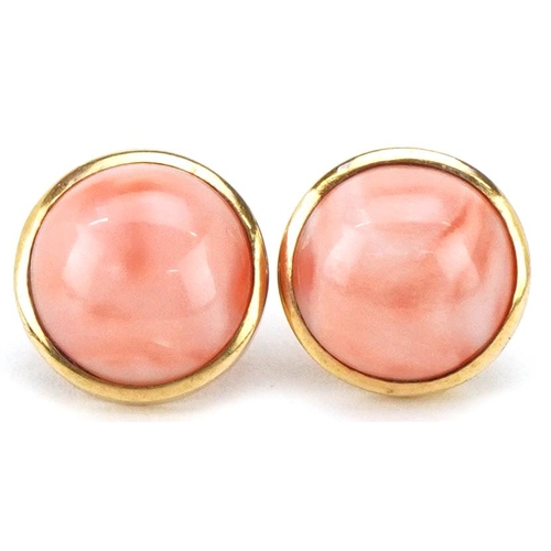 3342 - A pair of 18ct gold coral stud earrings, 13.2mm in diameter, total 5.7g.