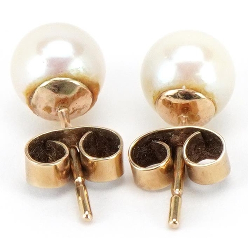 3347 - A pair of unmarked gold cultured pearl stud earrings, 7.5mm in diameter, total 2.0g.