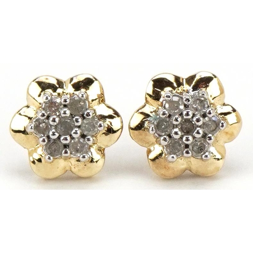 3198 - A pair of unmarked gold diamond flower head stud earrings, 9.2mm in diameter, total 1.8g.