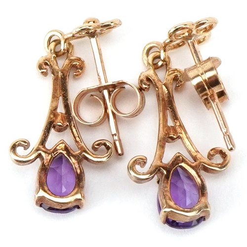 3485 - A pair of 9ct gold amethyst drop earrings, 2.1cm high, total 1.6g.