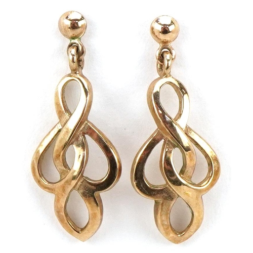 3224 - A pair of 9ct gold openwork drop earrings, 2.3cm high, total 1.5g.