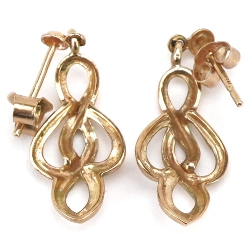 3224 - A pair of 9ct gold openwork drop earrings, 2.3cm high, total 1.5g.