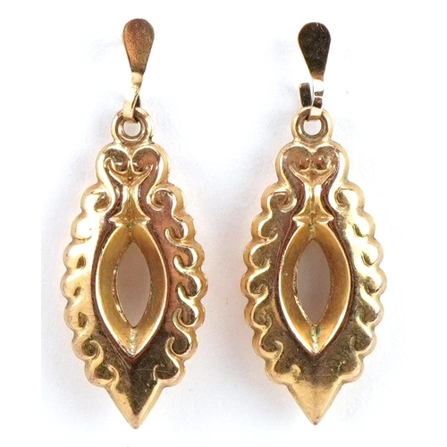 3212 - A pair of Victorian style yellow metal drop earrings, 2.8cm high, total 1.8g.