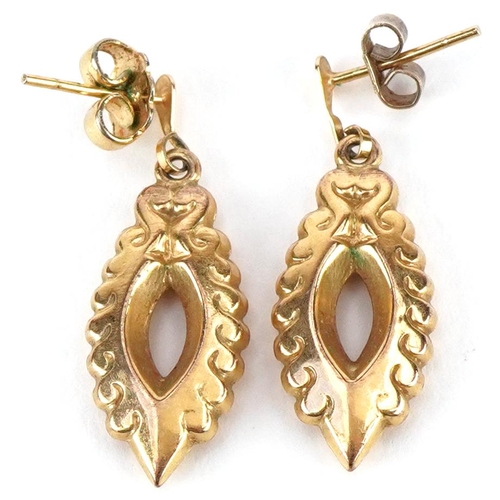 3212 - A pair of Victorian style yellow metal drop earrings, 2.8cm high, total 1.8g.