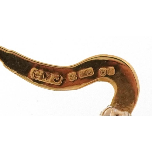 3167 - An 18ct two tone gold pavé set diamond brooch in the form of a saxophone, 3.2cm high, 3.1g.