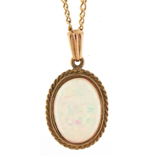 3143 - An unmarked gold cabochon opal pendant on a 9ct gold necklace, 2.5cm high and 46cm in length, total ... 