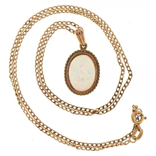 3143 - An unmarked gold cabochon opal pendant on a 9ct gold necklace, 2.5cm high and 46cm in length, total ... 