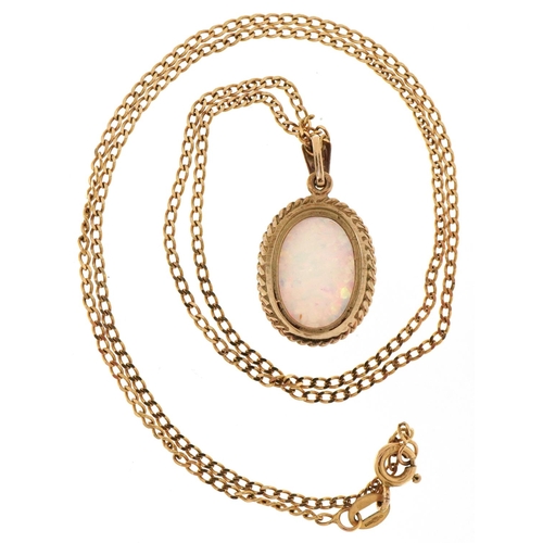 3143 - An unmarked gold cabochon opal pendant on a 9ct gold necklace, 2.5cm high and 46cm in length, total ... 