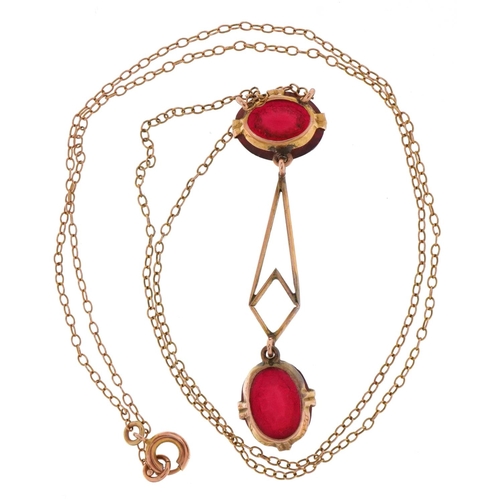 3502 - An Edwardian 9ct gold red glass openwork necklace, 40cm in length, 2.8g.