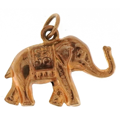 3157 - A 9ct gold charm in the form of an elephant, 2.2cm in length, 1.3g.