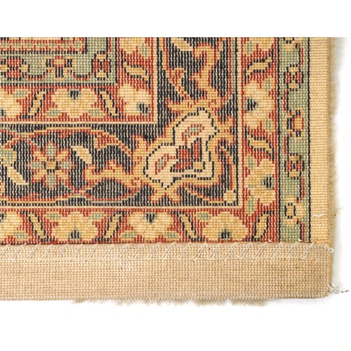 2007 - An Afghan Ziegler rug, late 20th century, the red field with stylized flower head design within a co... 