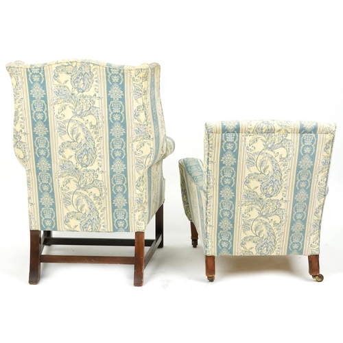 2038 - A late 20th century wingback armchair upholstered in a floral fabric, 103cm high, together with a si... 