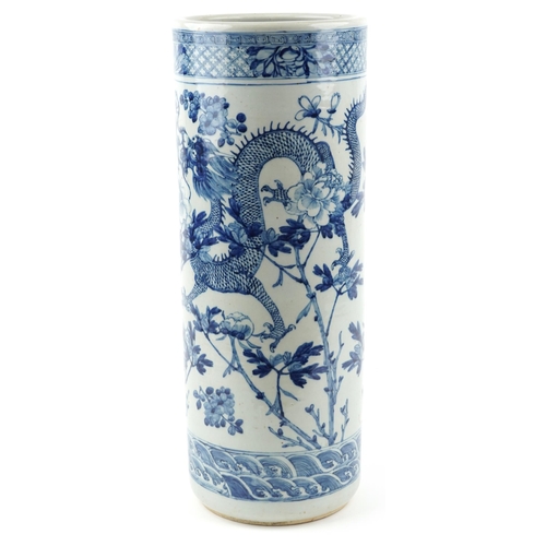 33 - A Chinese blue and white porcelain cylindrical stick stand, late 19th/early 20th century, decorated ... 