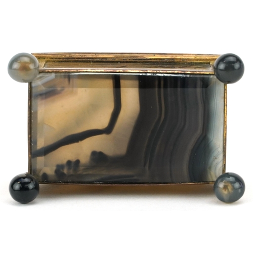 125 - A late 19th century French agate and ormolu mounted diminutive casket, with hinged lid, raised on ba... 