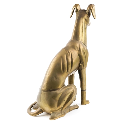 8 - A life size brass study of a seated Greyhound, 77cm high, approximately 23.5kg.