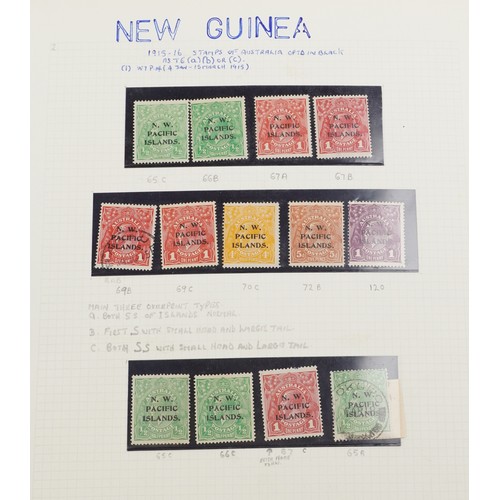 2219 - Red stamp album containing Papua and New Guinea stamps, a good selection of mint and used, to includ... 