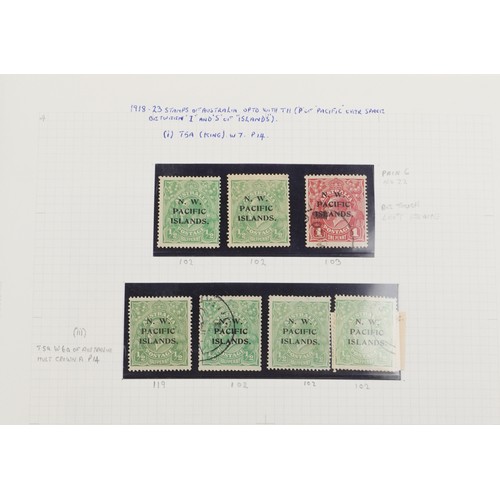 2219 - Red stamp album containing Papua and New Guinea stamps, a good selection of mint and used, to includ... 