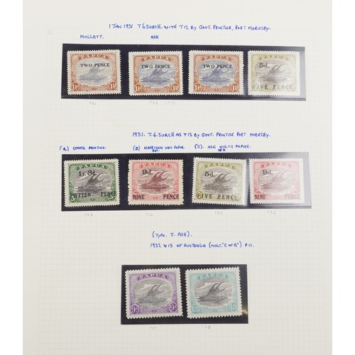 2219 - Red stamp album containing Papua and New Guinea stamps, a good selection of mint and used, to includ... 