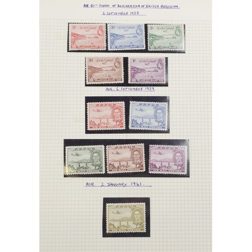 2219 - Red stamp album containing Papua and New Guinea stamps, a good selection of mint and used, to includ... 