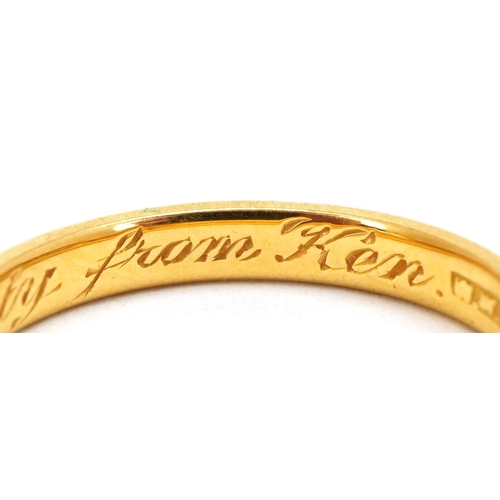 3147 - A 22ct gold wedding band with engraved inscription, London 1958, size N, 3.5g.