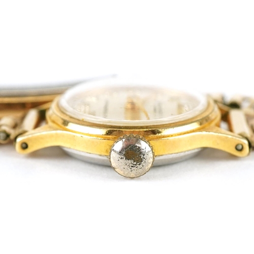 3118 - Accurist, a ladies gold plated manual wind wristwatch with rolled gold strap, the dial 16mm in diame... 