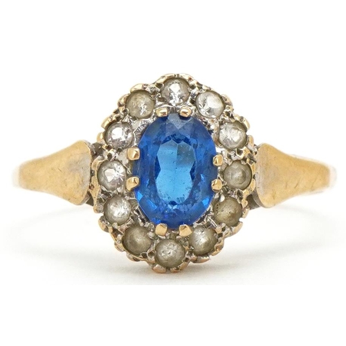 3214 - A 9ct gold blue spinel and clear stone cluster ring, size R, 2.4g.