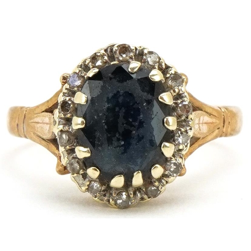 3163 - A 9ct gold sapphire and diamond cluster ring, size P, 3.9g.