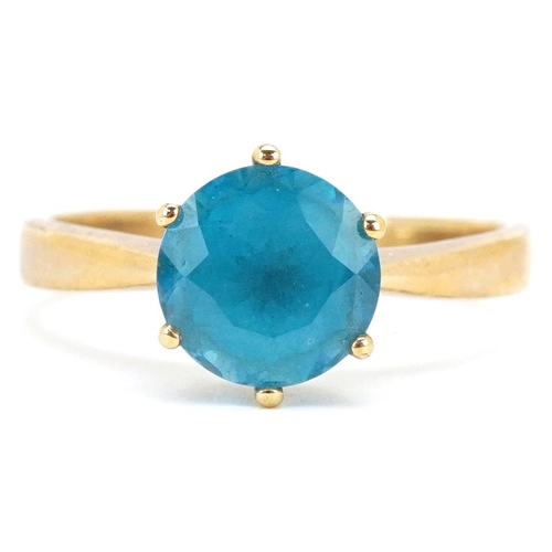 3179 - A 9ct gold blue topaz solitaire ring, the topaz approximately 9.25mm in diameter, size W, 4.6g.