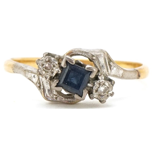 3486 - An 18ct gold diamond and sapphire crossover ring, size N, 2.5g.