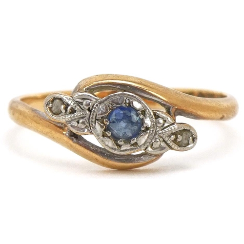 3484 - A 9ct gold and platinum sapphire and diamond crossover ring, size K, 1.5g.