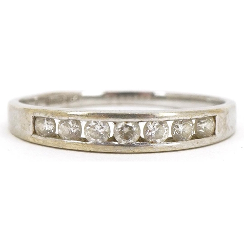 3475 - A 9ct white gold cubic zirconia half eternity ring, size P, 1.6g.