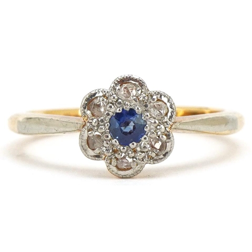 3123 - An 18ct gold and platinum diamond and sapphire flower head ring, size K, 2.7g.