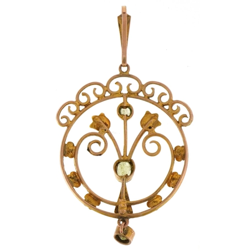 3024 - An Edwardian 9ct gold green stone and seed pearl openwork pendant, 4.8cm high, 2.8g.