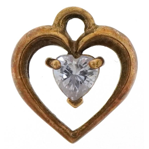 3656 - A yellow metal love heart pendant set with a purple stone, 1.2cm high, 0.7g.