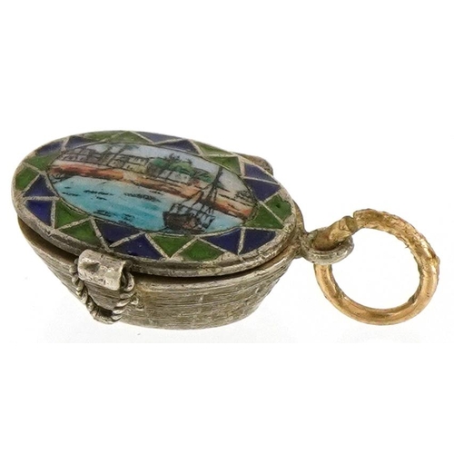 3649 - An Egyptian Revival silver and enamel pendant in the form of a sarcophagus, 1.6cm in length, 1.9g.