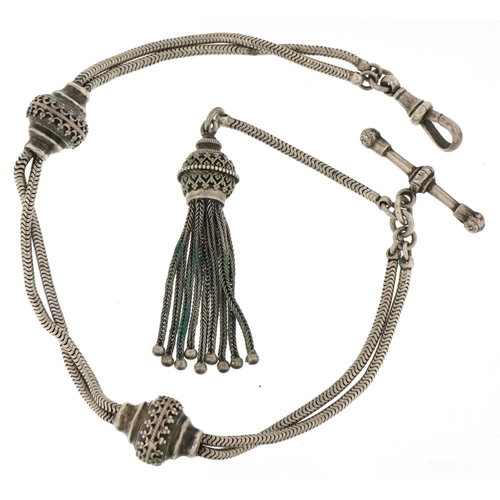 3346 - A Victorian white metal ladies watch chain with tassel and T bar, 32cm in length, 22.4g.