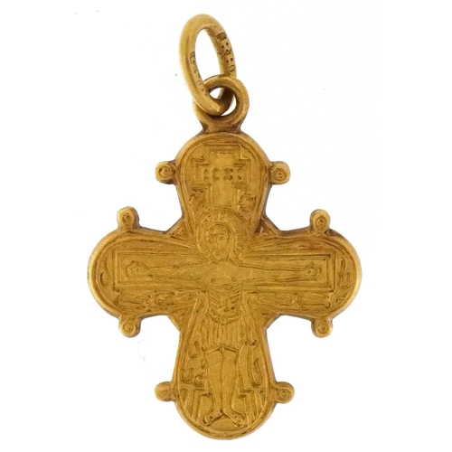 3506 - A Renaissance Revival 14ct gold cross pendant engraved with religious icons, 2cm high, 1.1g.